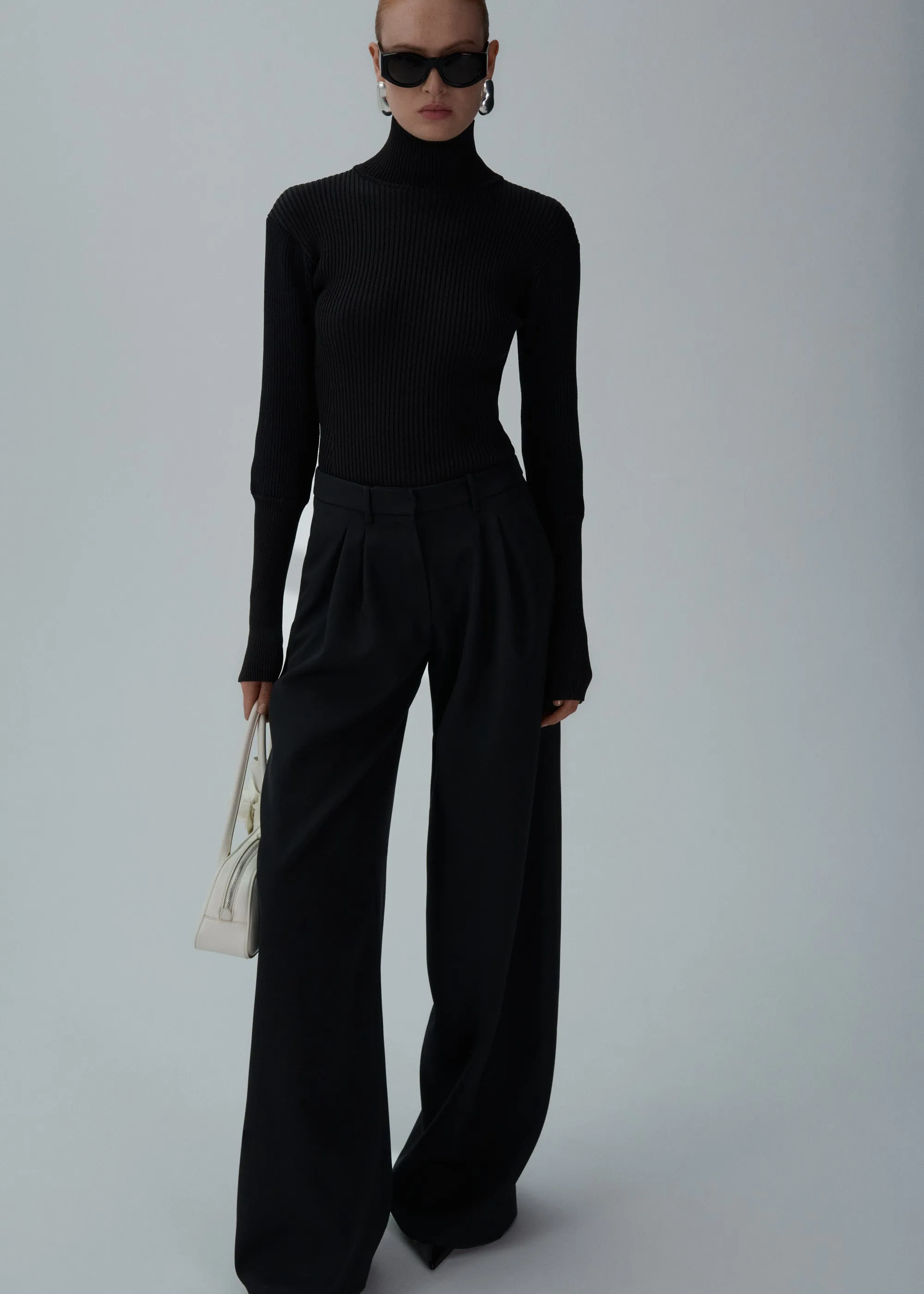 Wide-leg tailored wool pants in black